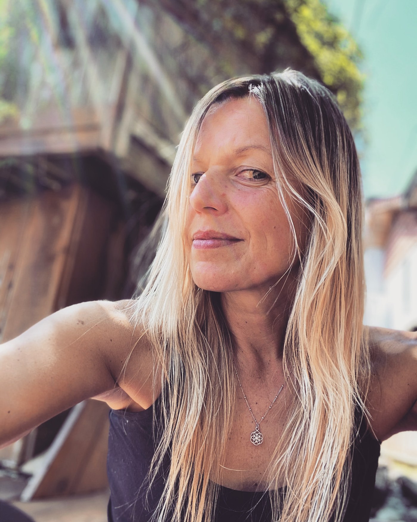 Christina Erl outside her healing cottage